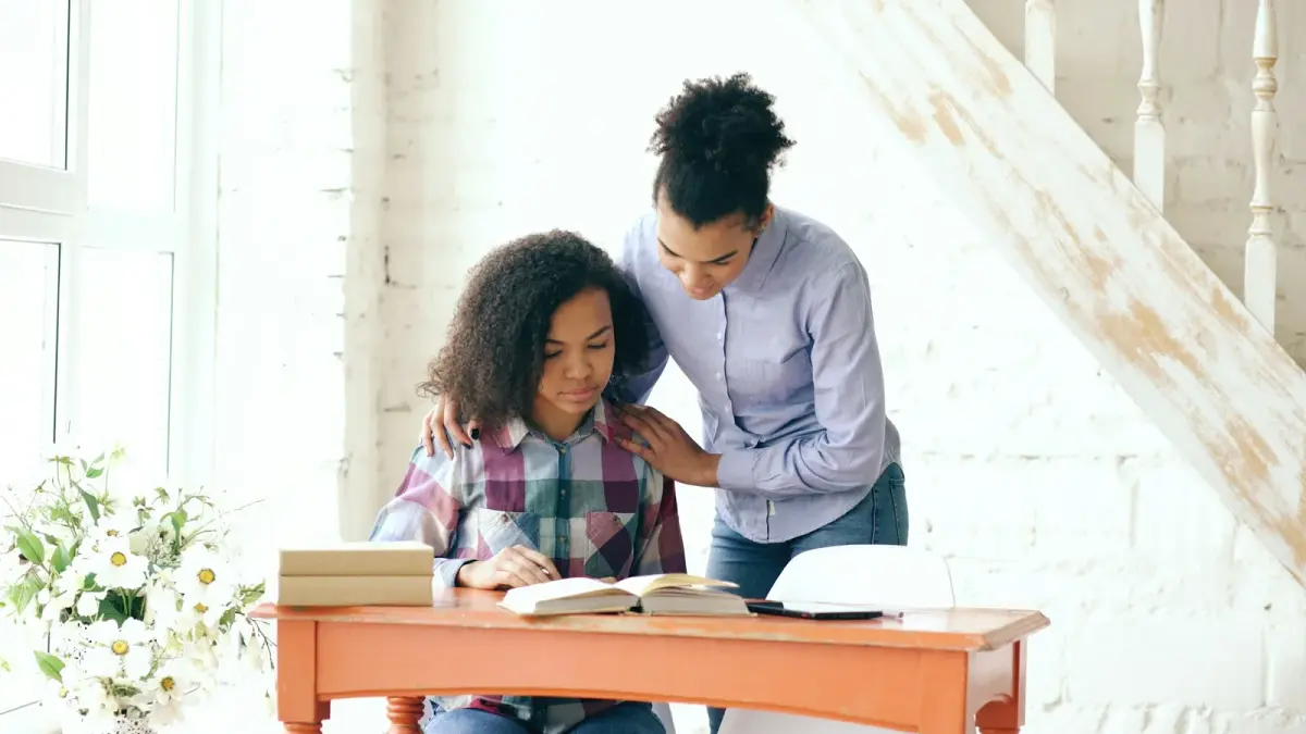 Support worker visiting a family at home for a check-in
